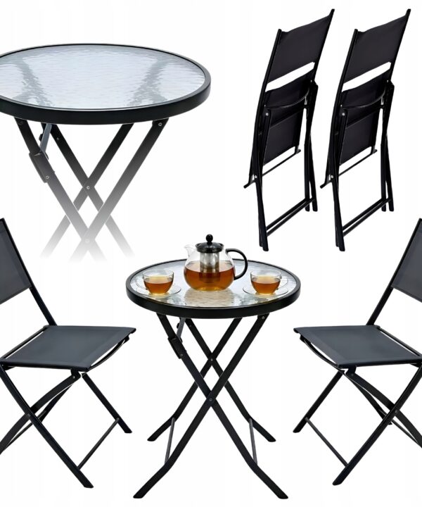 Round glass-top patio table with a tea set, surrounded by black folding chairs.