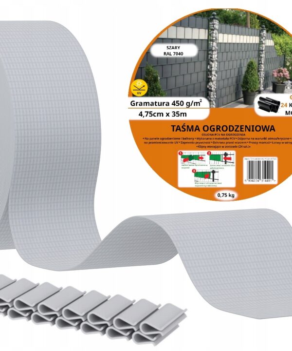 Large roll of white garden fencing tape with clips laid out below and an orange label reading 'Taśma ogrodzeniowa'.